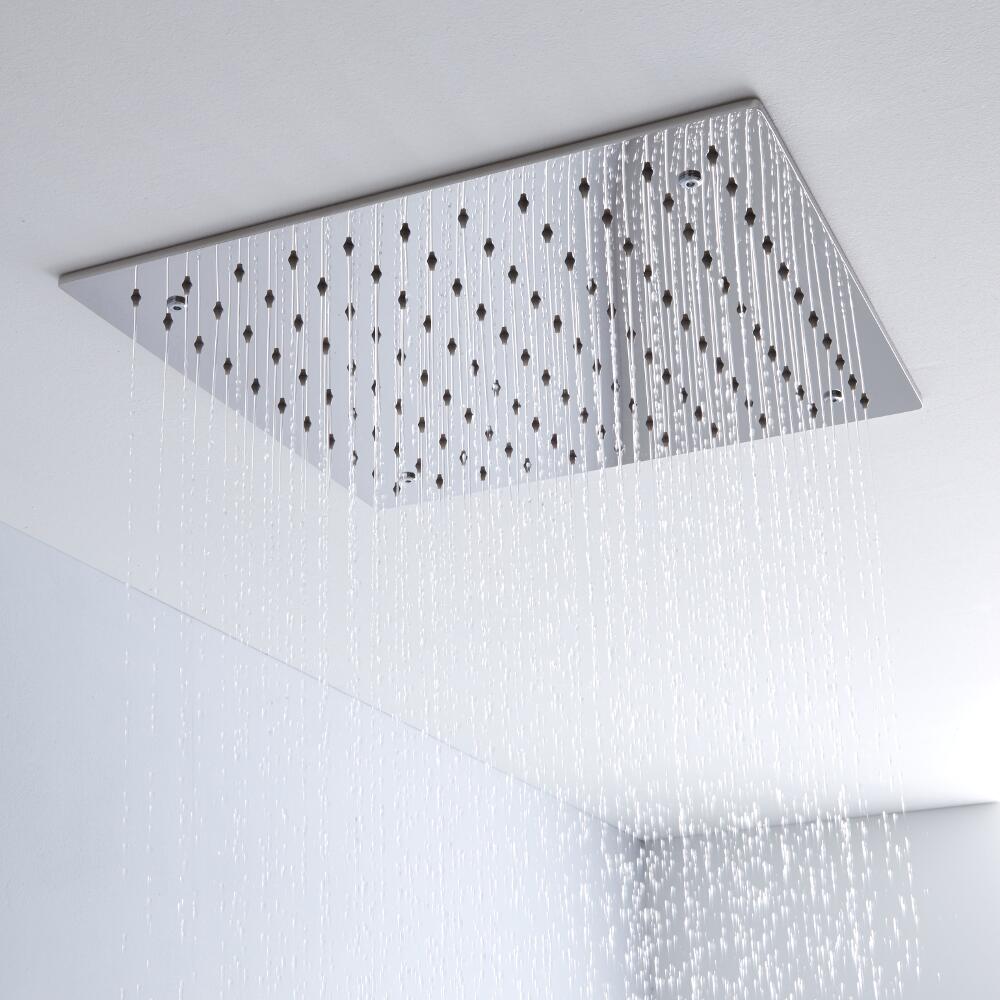 chrome rainfall shower head fitted into the ceiling