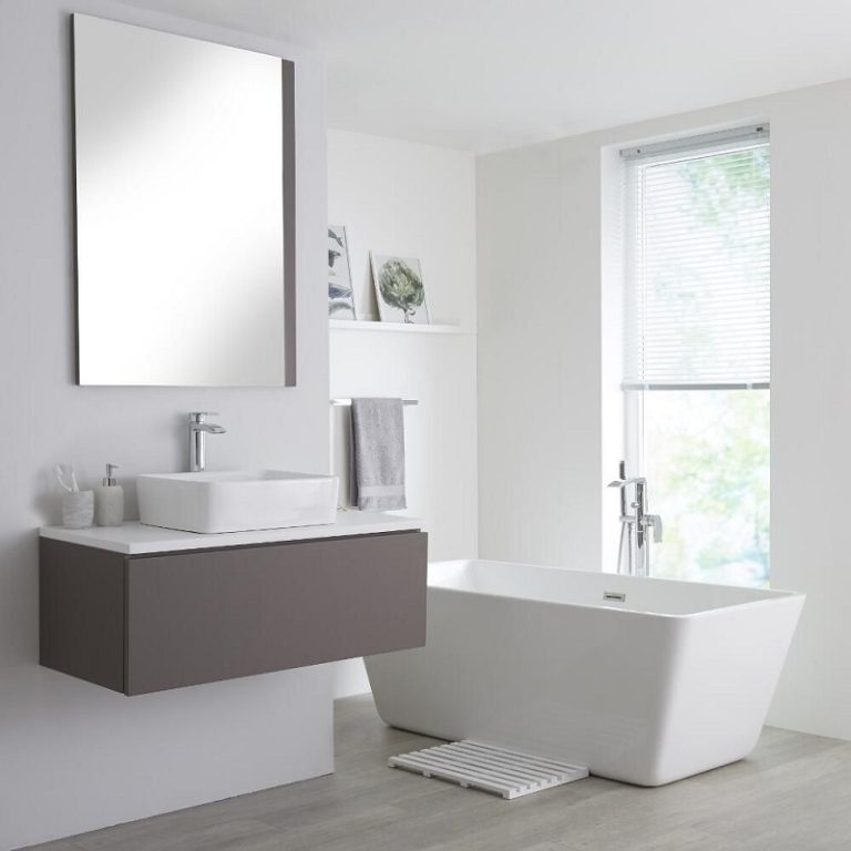 grey vanity unit with counter top basin and tap