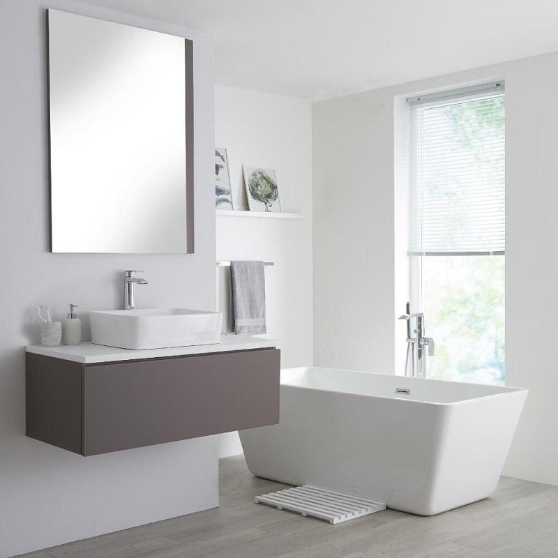 grey vanity unit with counter top basin and tap