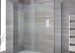 walk in shower with rectangular white shower tray and drying area