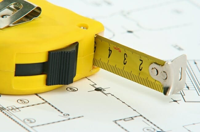 measuring tape on a plan