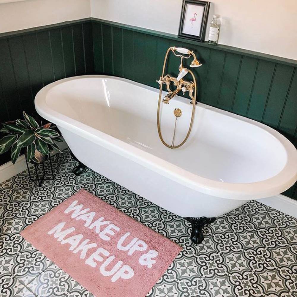 Rosie's traditional bath space with freestanding bath and gold brassware