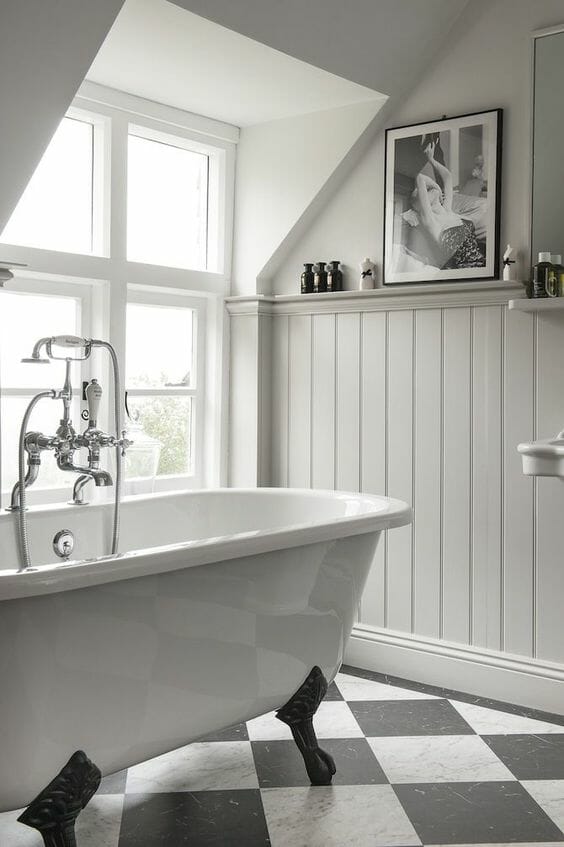 a traditional perido style bathroom with wood finishes