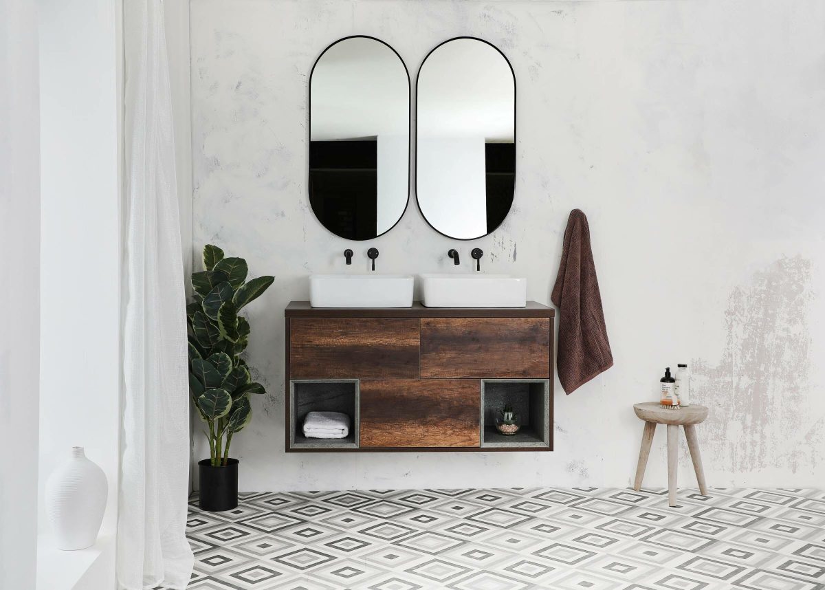 a wall hanging vanity unit with a double basin