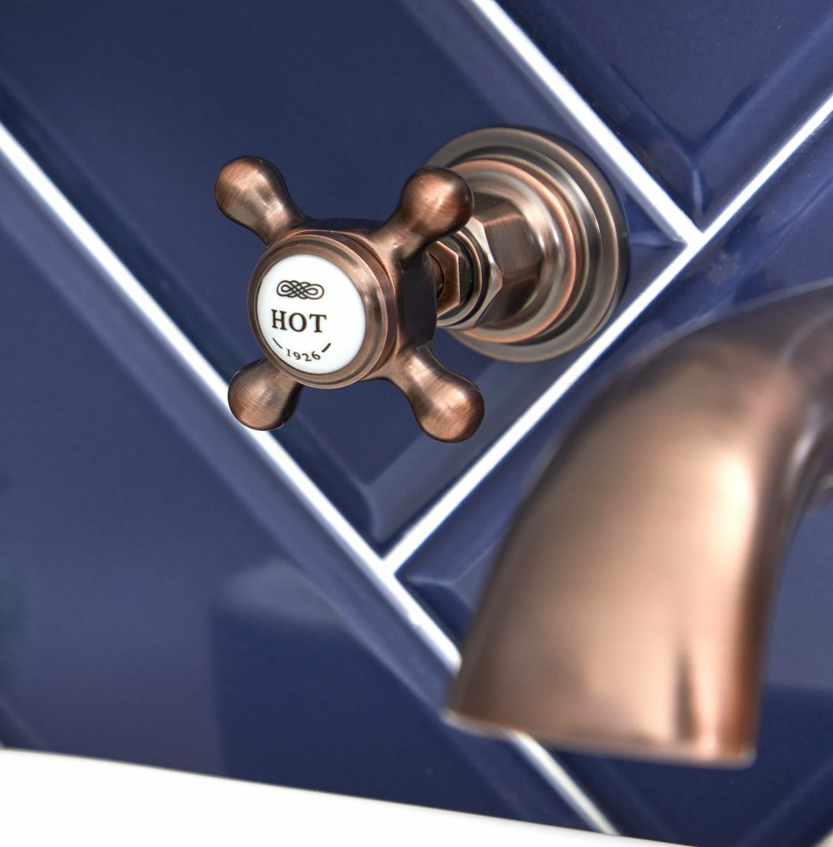 oil rubbed bronze wall-mounted tap