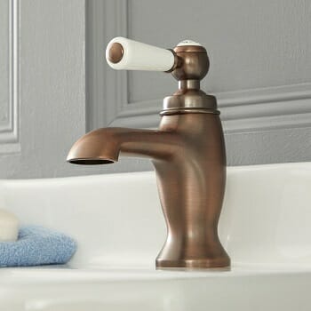 Milano Elizabeth oil-rubbed bronze tap with white trim