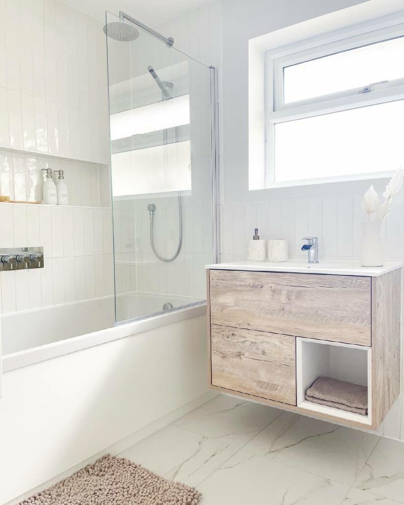 vanity unit and shower over the bath