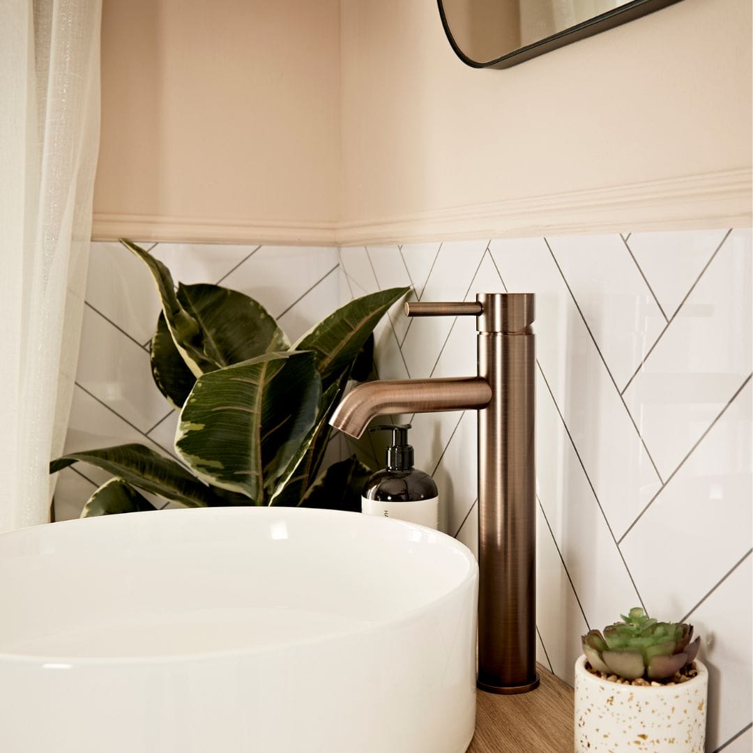 close up of basin in a very demure bathroom space. 